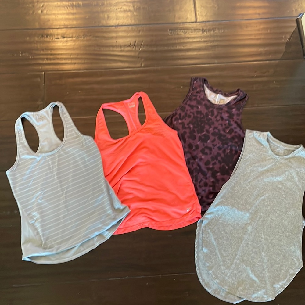 Lot of 4 size Small workout tanks.